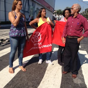 Members of the MTST stand on the crosswalk during a march on May 8, 2014.